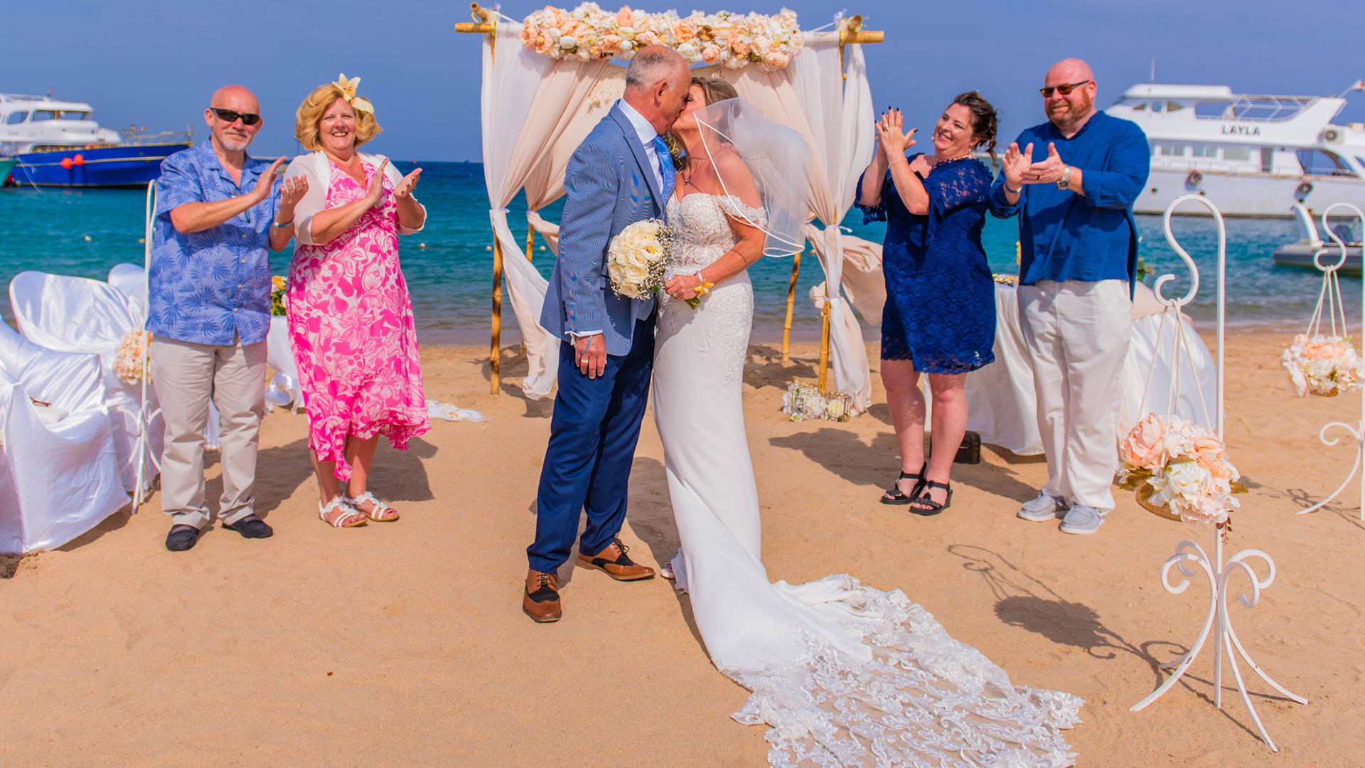 egyptwed-groom-bride-weddingarch-friends-wedding-beach-renewal-abroad-egypt-hurghada-redsea