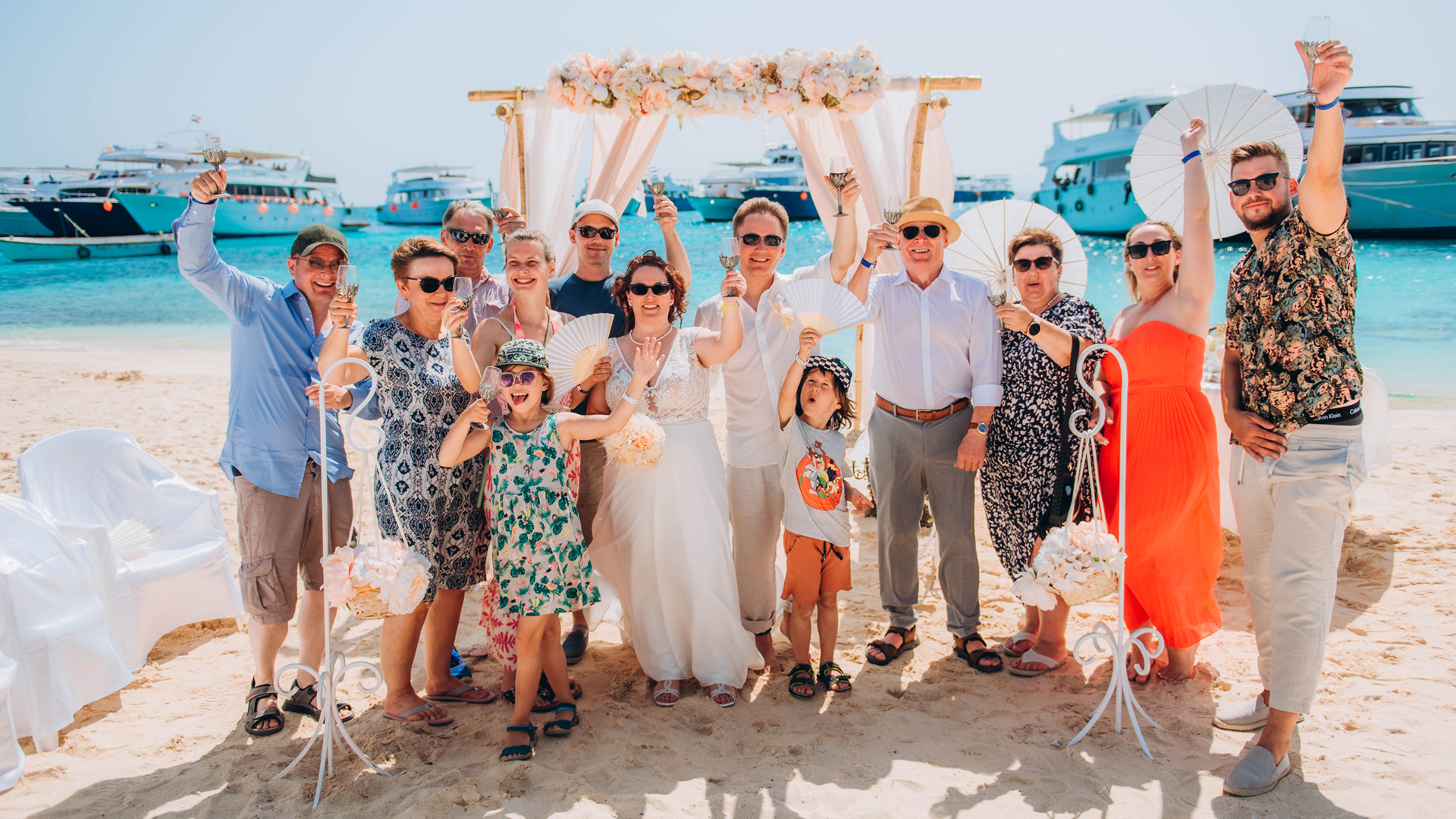 egyptwed-bride-groom-family-champagne-weddingearch-wedding-island-renewal-abroad-egypt-hurghada-red-sea